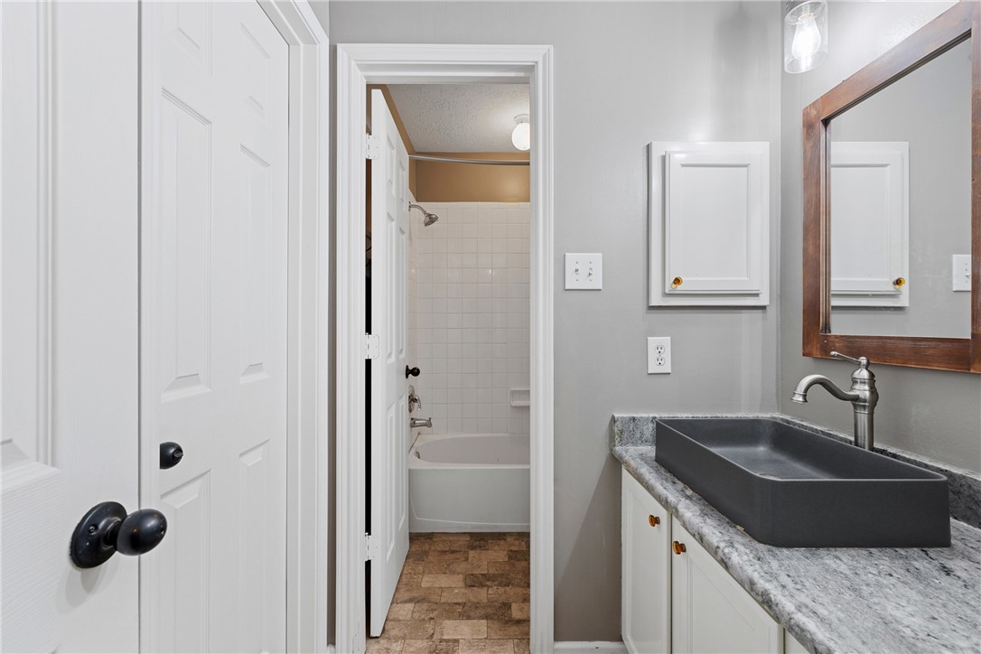 2092 Farm To Market 1486 Anderson, TX 77830 - Photo 15 of 42 a kitchen with a sink and a refrigerator
