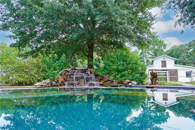 a view of a house with a big yard
