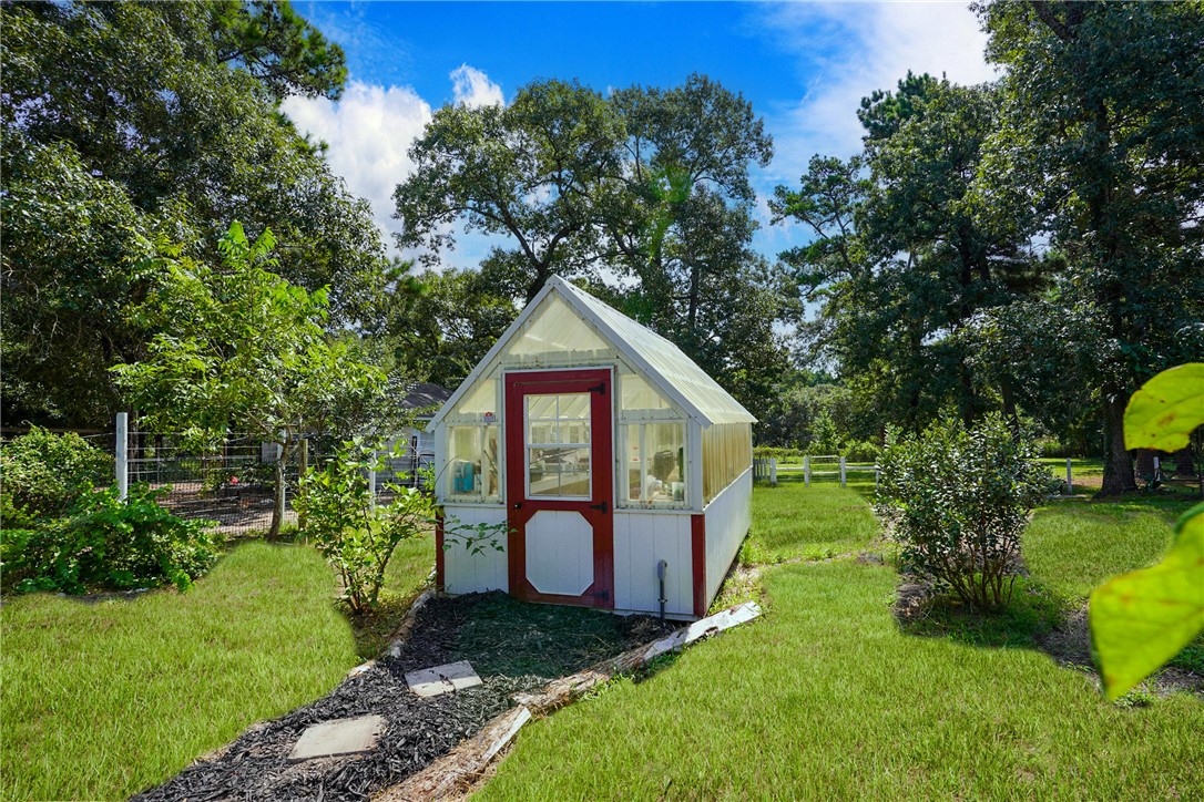 2092 Farm To Market 1486 Anderson, TX 77830 - Photo 25 of 42 a view of backyard with a garden and entertaining space