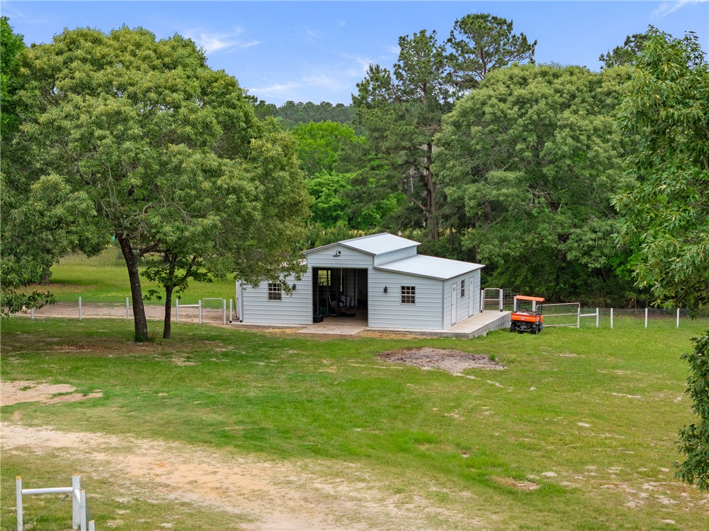 2092 Farm To Market 1486 Anderson, TX 77830 - Photo 26 of 42 a view of a house with a yard