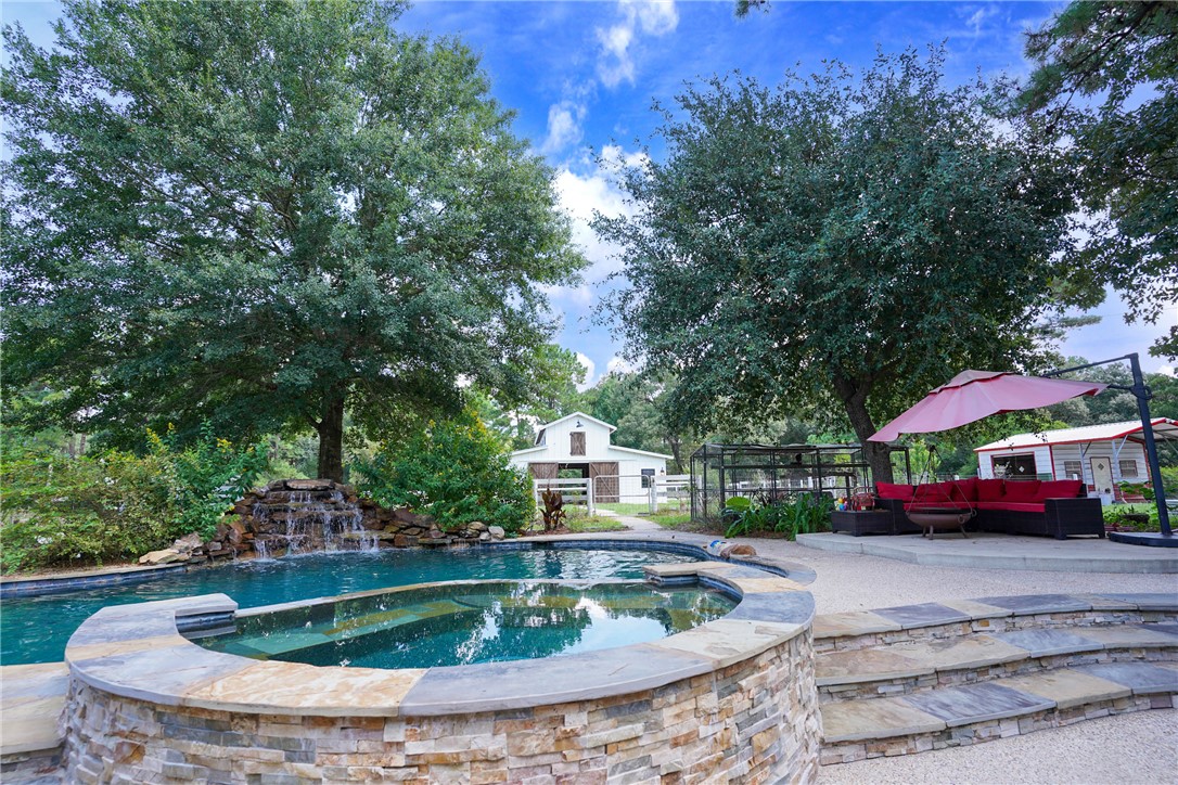 2092 Farm To Market 1486 Anderson, TX 77830 - Photo 3 of 42 a view of swimming pool with a table and chairs