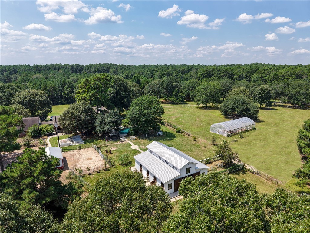 2092 Farm To Market 1486 Anderson, TX 77830 - Photo 32 of 42 an aerial view of a house with a garden and lake view