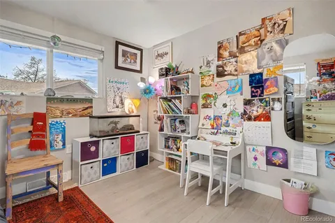 a view of a workspace with furniture