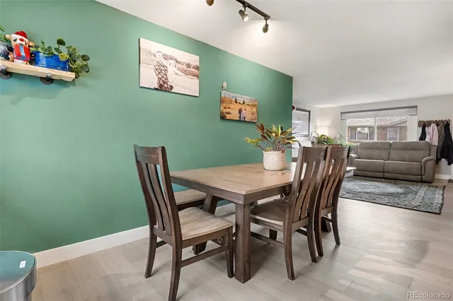 a view of a dining room with furniture