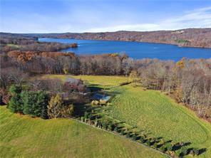 238 Mills Road North Salem, NY 10560 - Photo 1 of 1 Circa 1860 reconstructed Barn on 6.5 Acres. View of the Titicus Reservoir.