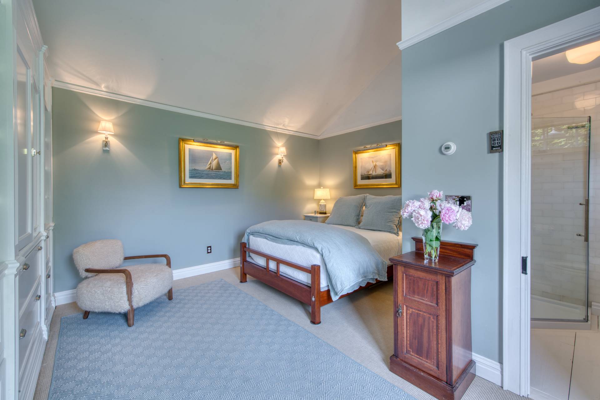 23 Howard Street Sag Harbor, NY 11963 - Photo 12 of 14 a bedroom with bed and a couch