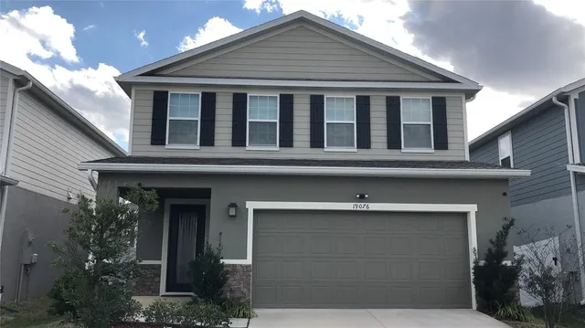 a front view of house with yard