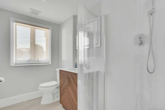 a bathroom with a shower curtain