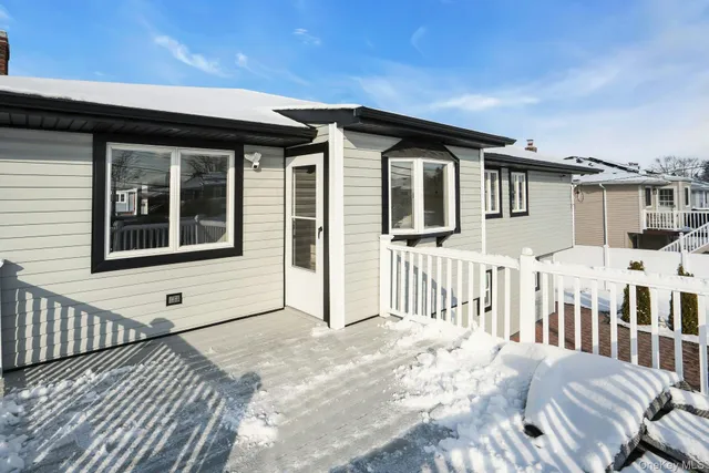 a view of a terrace with wooden floor