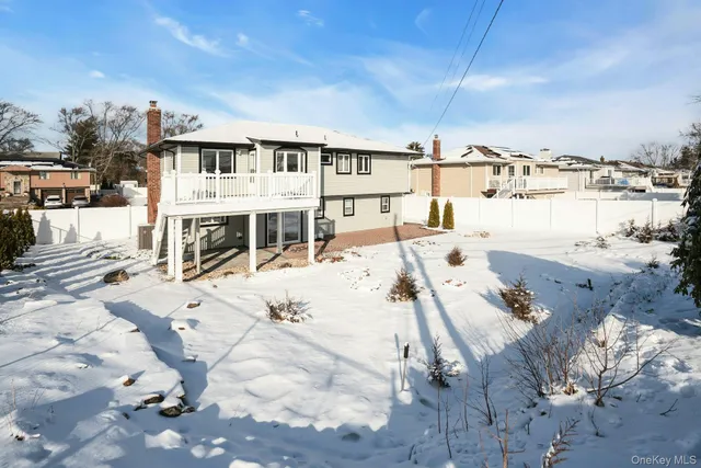 a view of a terrace with wooden fence