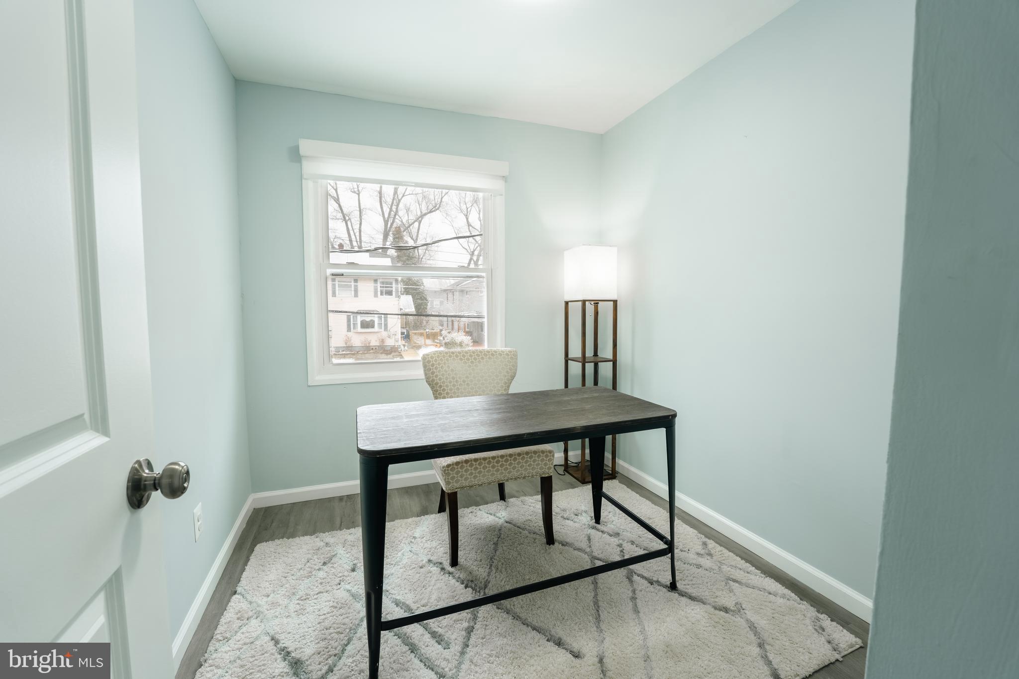 3410 Embry Street Silver Spring, MD 20902 - Photo 19 of 28 a view of a workspace with furniture and window