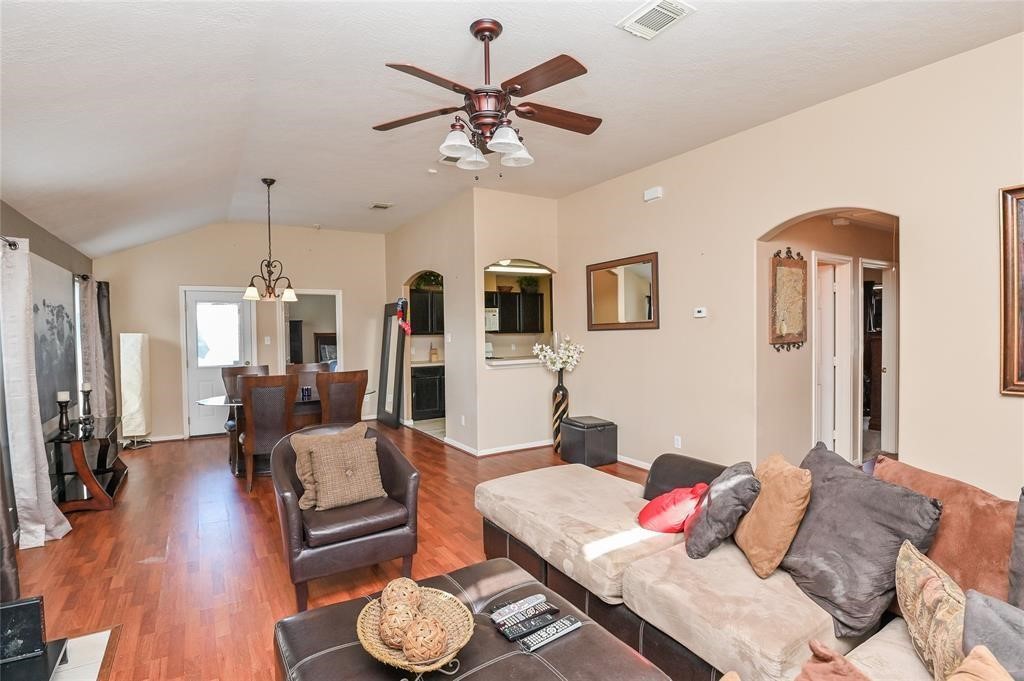 18446 South Wimbledon Drive Katy, TX 77449 - Photo 12 of 24 a living room with furniture and wooden floor