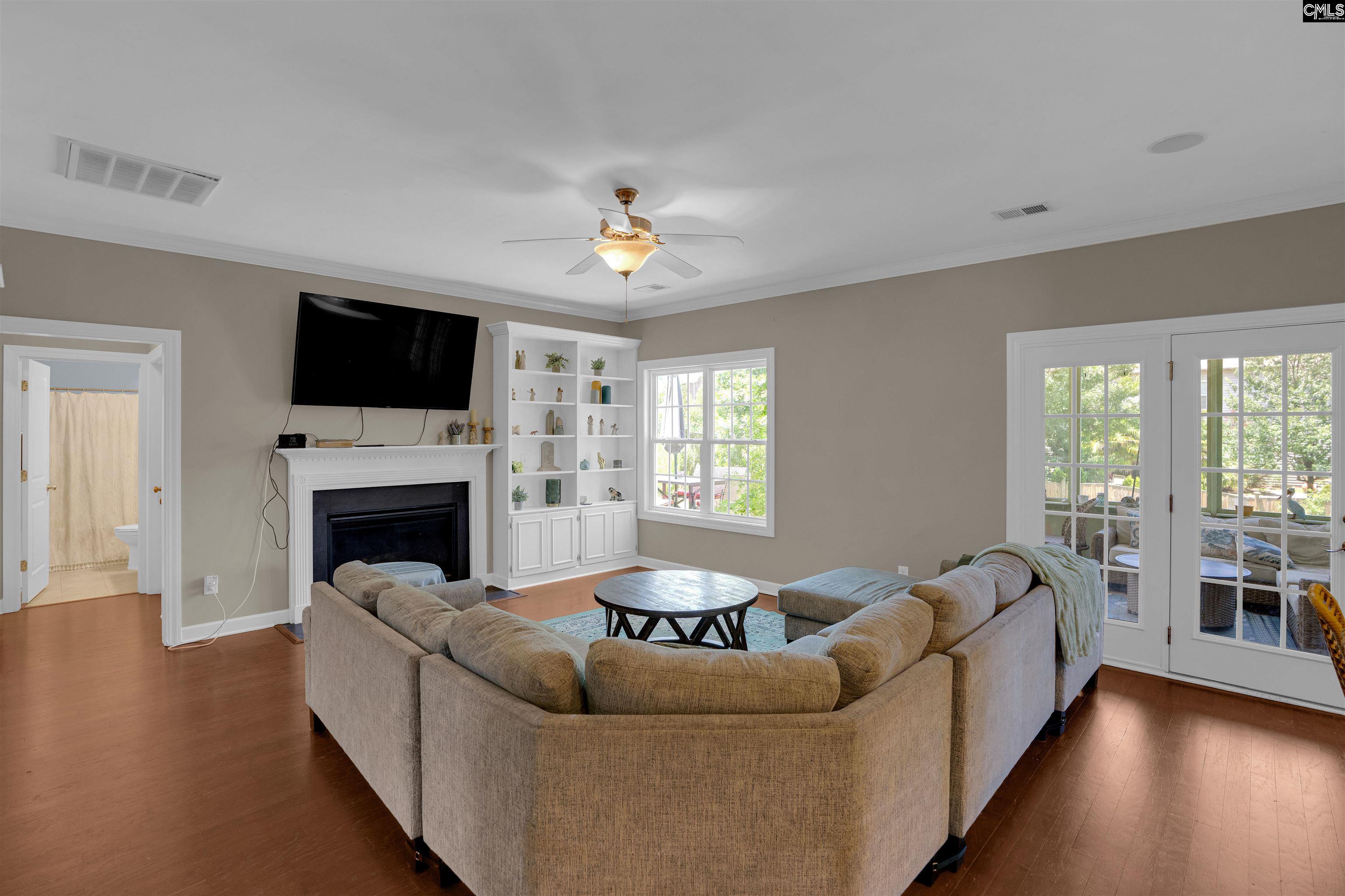 321 Asa Rose Lexington, SC 29072 - Photo 16 of 52 a living room with furniture fireplace and flat screen tv