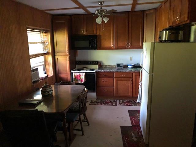 696 Blue Rock Road Purlear, NC 28665 - Photo 22 of 34 a kitchen with a sink cabinets and window