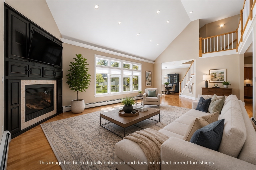 270 Mendon Road Sutton, MA 01590 - Photo 15 of 42 a living room with furniture fireplace and flat screen tv