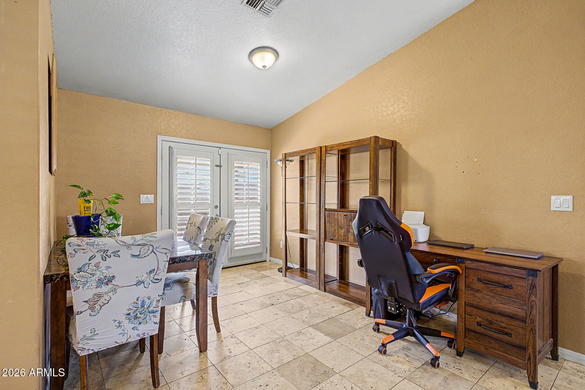 660 South Stardust Lane Apache Junction, AZ 85120 - Photo 5 of 15 a view of a workspace with furniture and a window