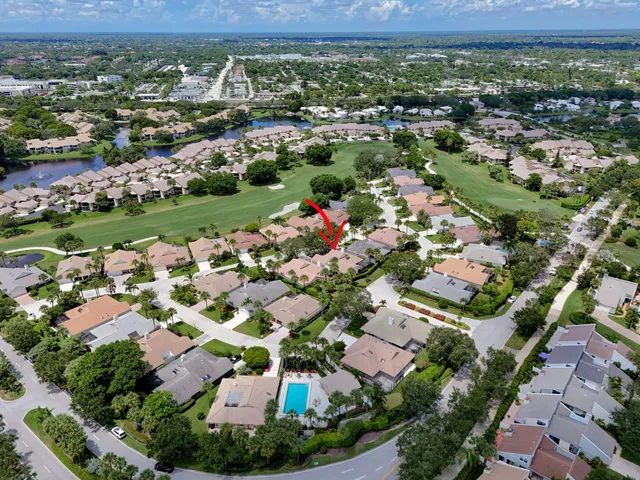 an aerial view of a house with a garden