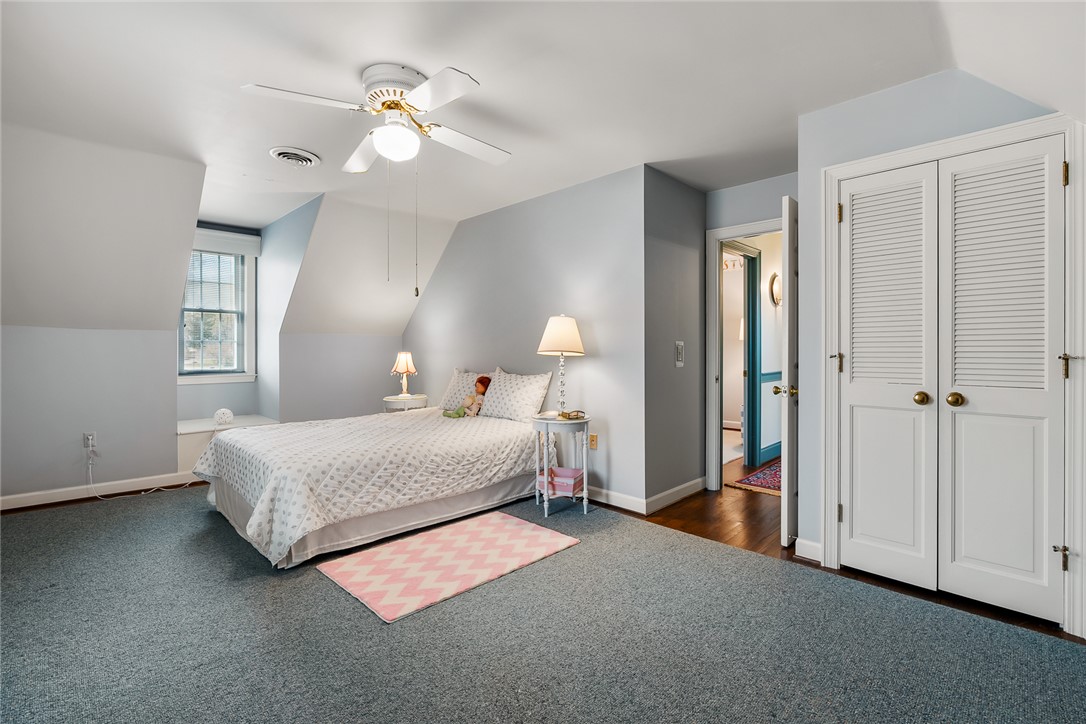 401 Berkshire Hill Anderson, SC 29621 - Photo 28 of 39 An inviting bedroom features a cozy bed and ample natural light from the window.