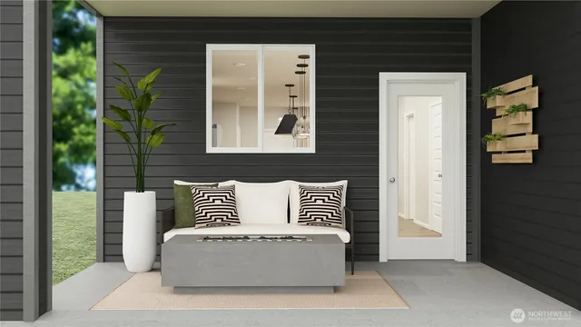 a view of a door and chair and an entryway