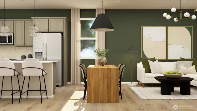 a dining room with furniture and a window