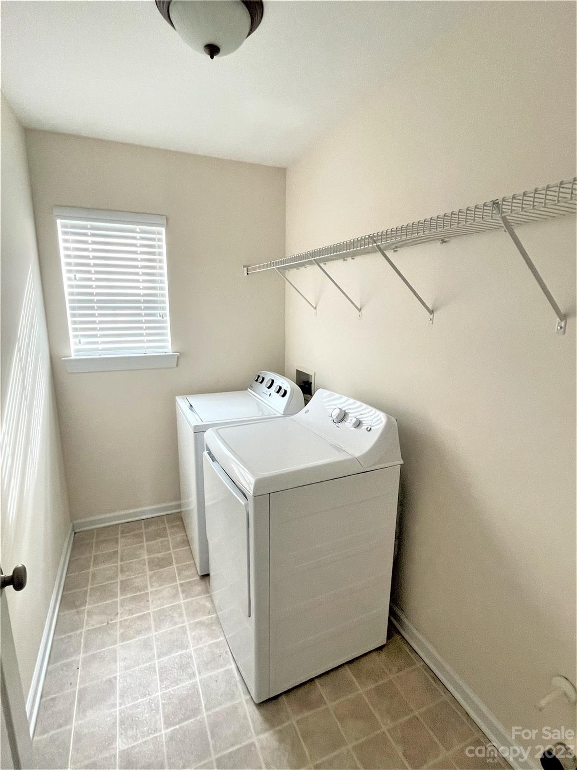 6405 Baltray Road Charlotte, NC 28278 - Photo 11 of 14 a utility room with a washer and dryer