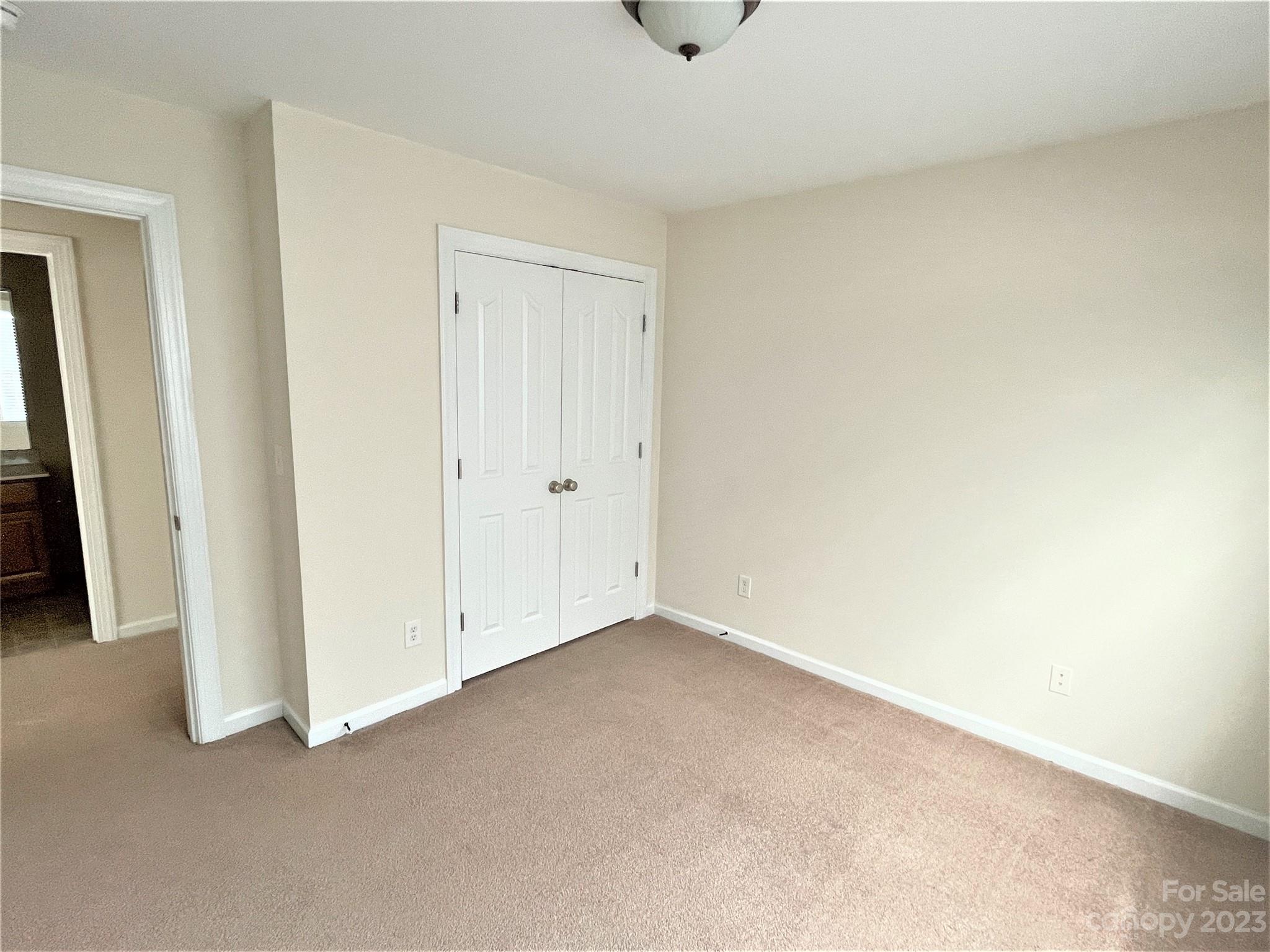 6405 Baltray Road Charlotte, NC 28278 - Photo 13 of 14 an empty room with a natural light
