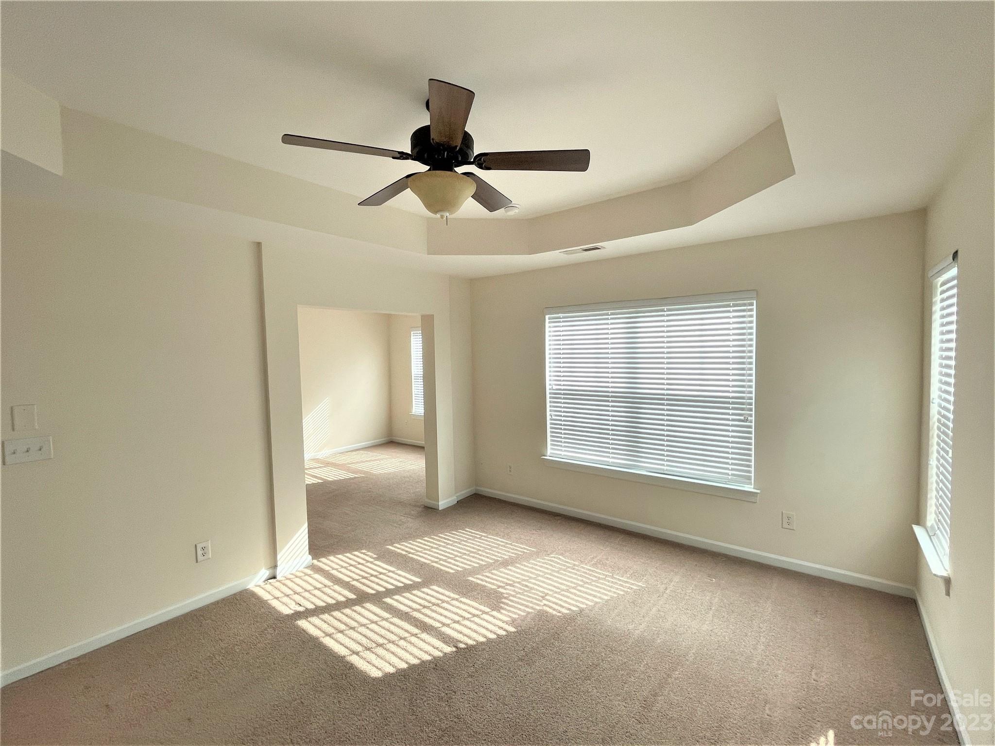 6405 Baltray Road Charlotte, NC 28278 - Photo 8 of 14 a view of an empty room with a window