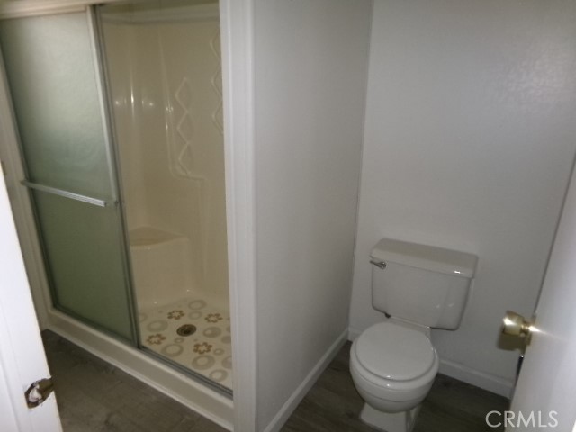 324 Ridgecrest Parkway Oroville, CA 95966 - Photo 21 of 33 a white toilet sitting next to a shower