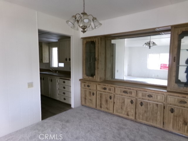 324 Ridgecrest Parkway Oroville, CA 95966 - Photo 23 of 33 a spacious bathroom with a granite countertop sink and a mirror