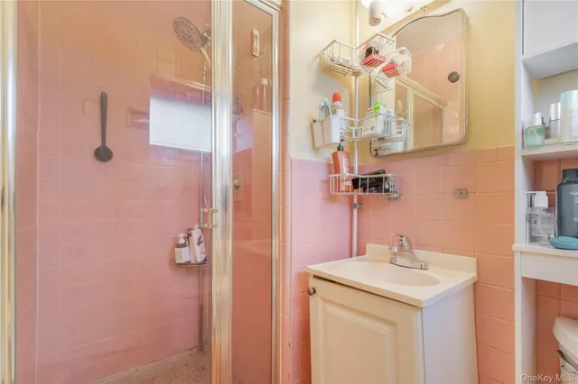a bathroom with a sink and mirror