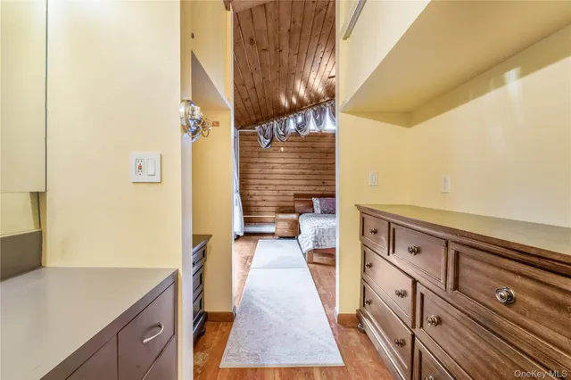 a hallway with washer and dryer