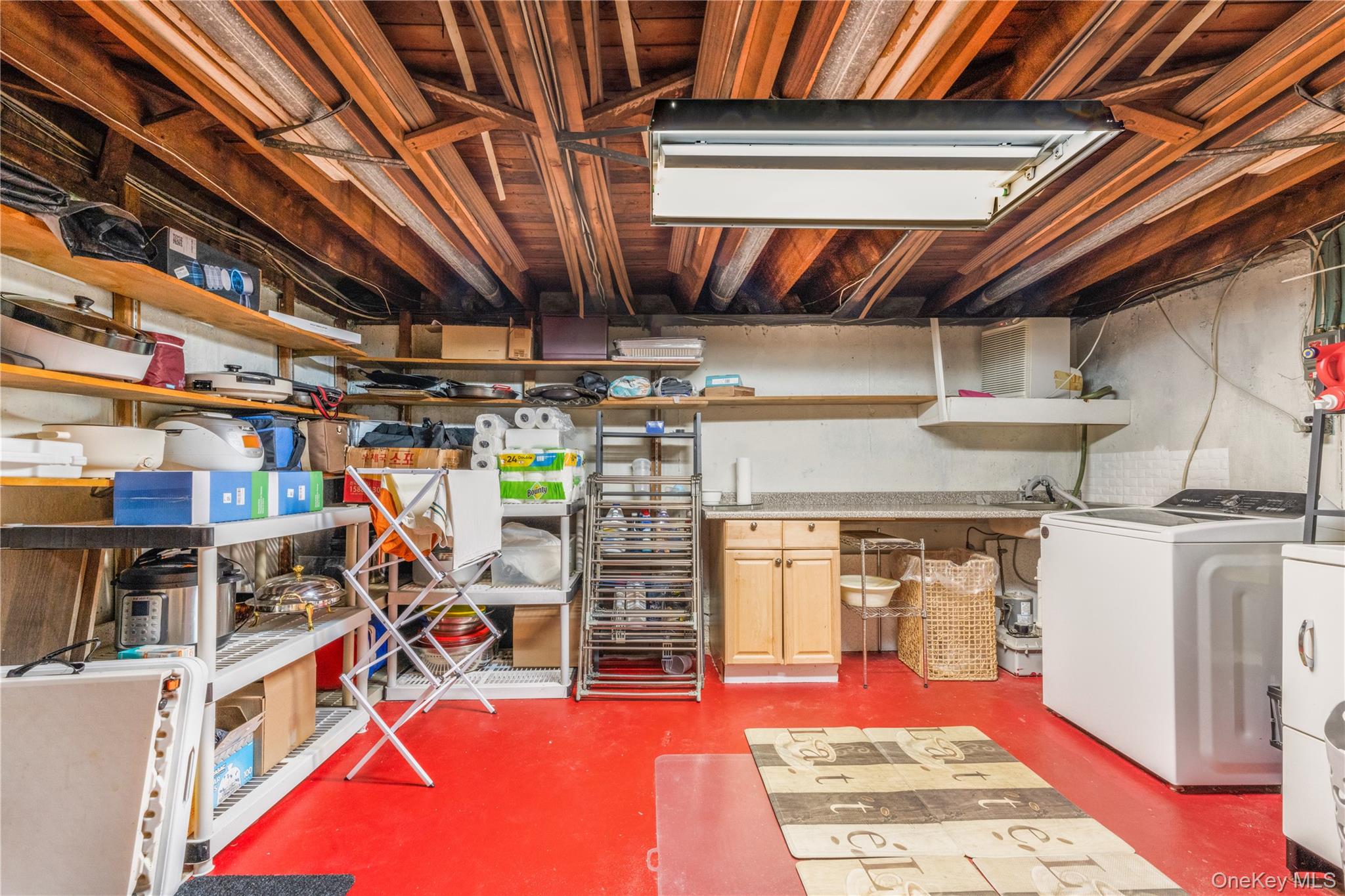 78 Joyce Road Plainview, NY 11803 - Photo 18 of 23 a view of a room with racks