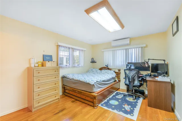 a bedroom with a bed and furniture