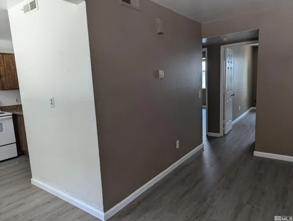 a bathroom with a toilet a sink and shower