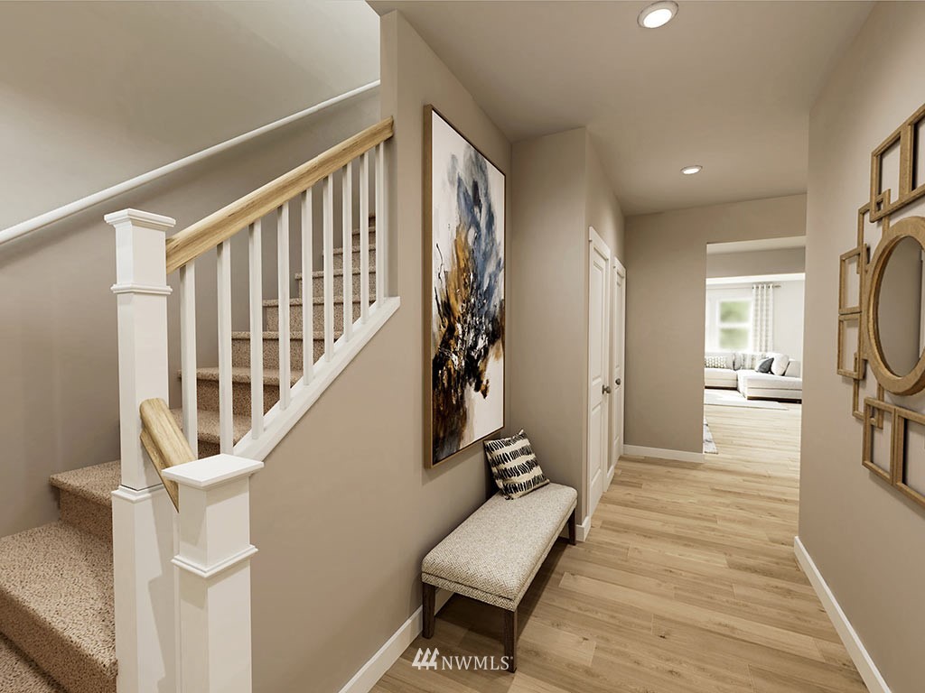 11 181st Street Southeast, Unit 17 Bothell, WA 98012 - Photo 3 of 32 a view of entryway and hall with wooden floor