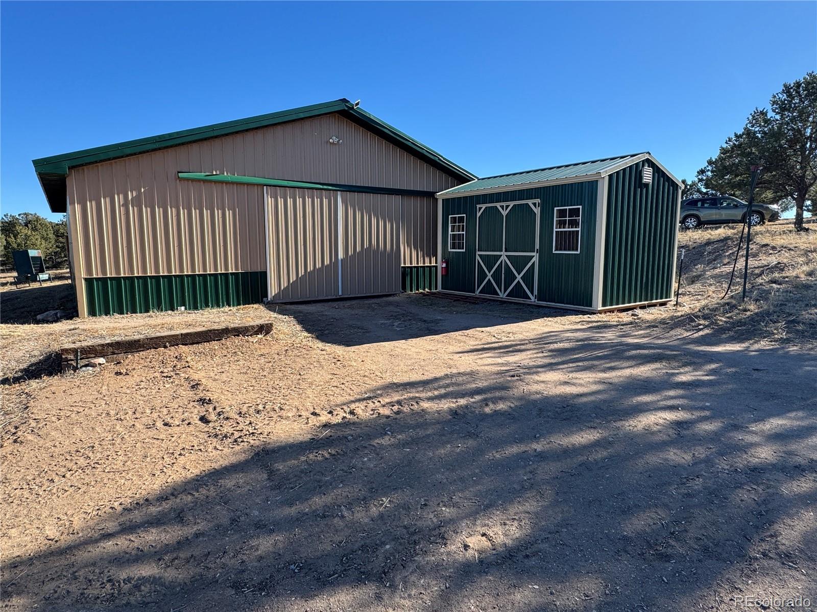 620 Falling Rock Road Cotopaxi, CO 81223 - Photo 22 of 32 a front view of a house with a yard