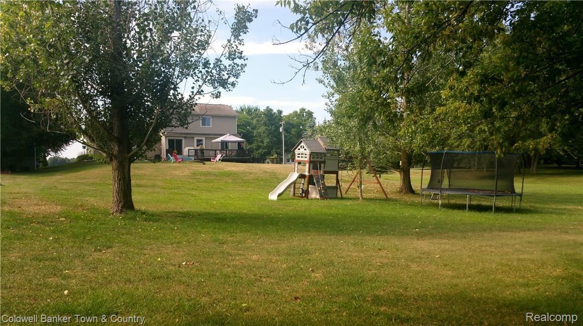 10770 Chase Lake Road Fowlerville, MI 48836 - Photo 18 of 43 ExteriorBack3.jpg