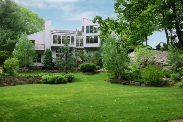 a view of backyard of a house