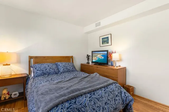 a workspace with furniture and wooden floor