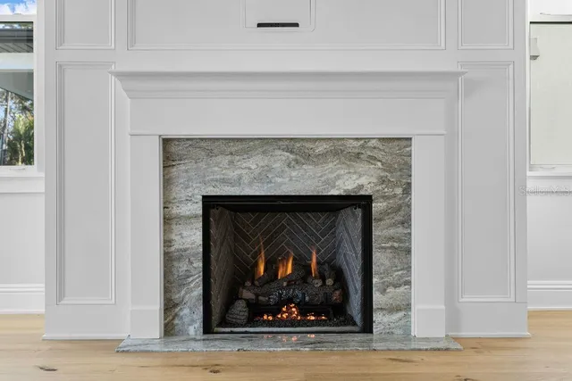 a living room with a fireplace