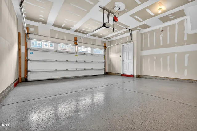 a picture of a bathroom with a refrigerator