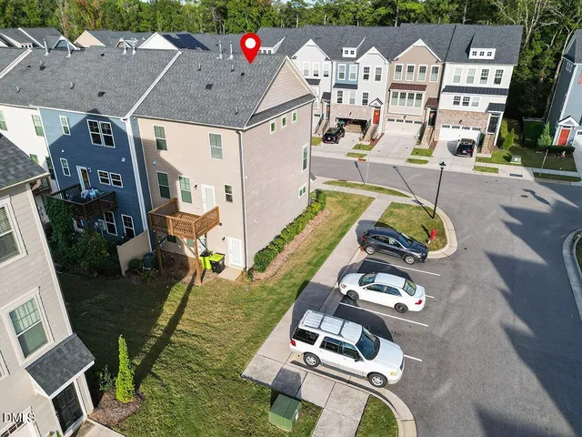 an aerial view of a house with swimming pool