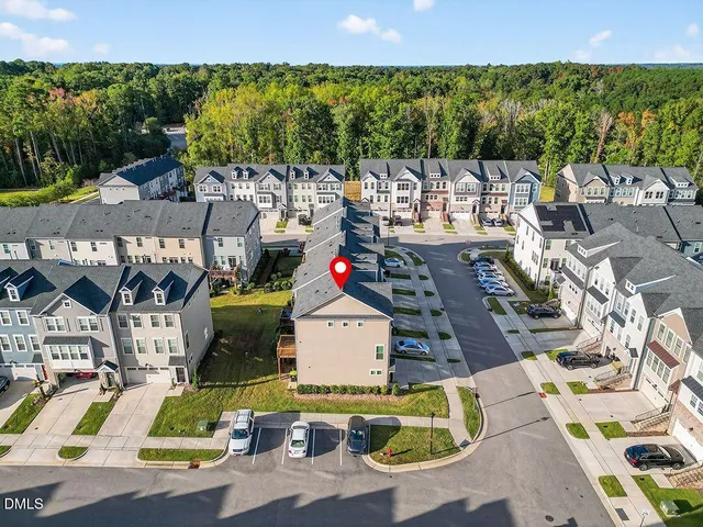 a view of swimming pool with outdoor seating and city view