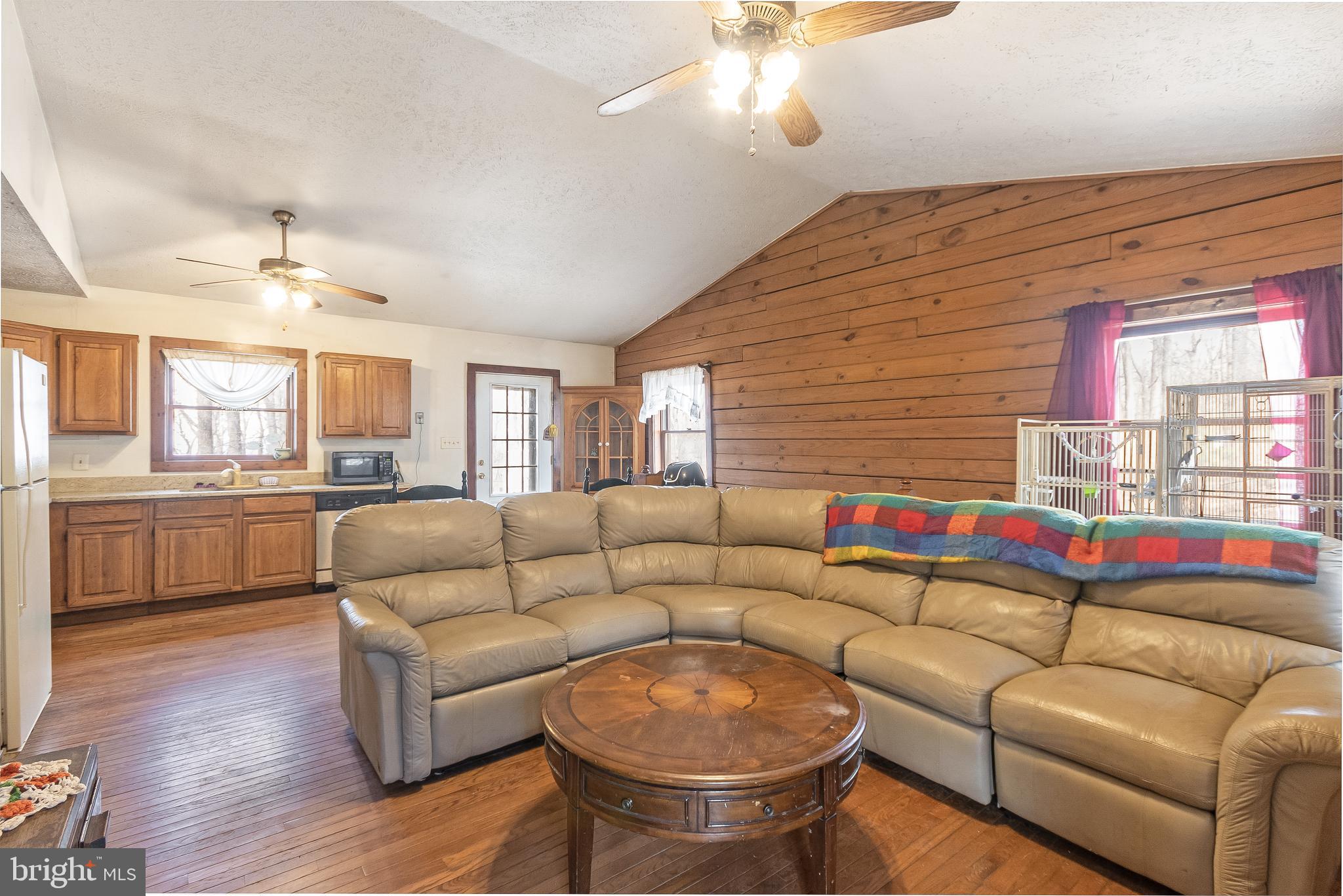 100 Old Log Road Linden, VA 22642 - Photo 2 of 22 Living room and kitchen with cathedral ceiling