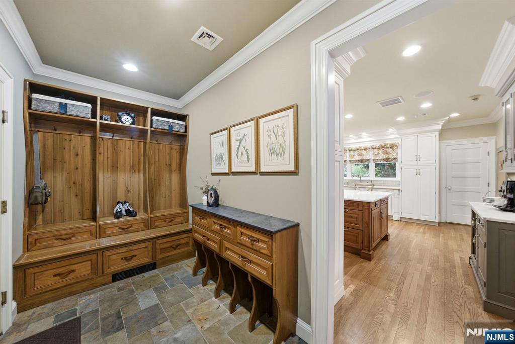 203 Heights Road Ridgewood, NJ 07450 - Photo 28 of 41 a room with wooden floor and furniture