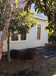 152 South Zander Way Santa Rosa Beach, FL 32459 - Photo 14 of 16 a front view of a house with a yard