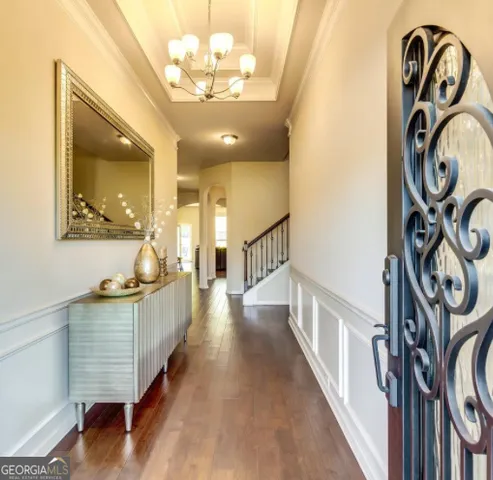 a view of a hallway with washer and dryer