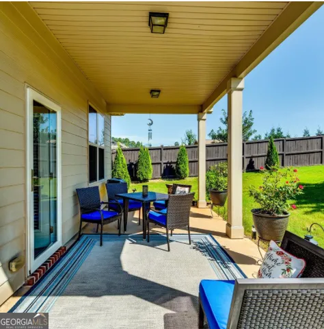 a building outdoor space with patio furniture