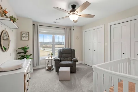 a utility room with sink dryer and washer