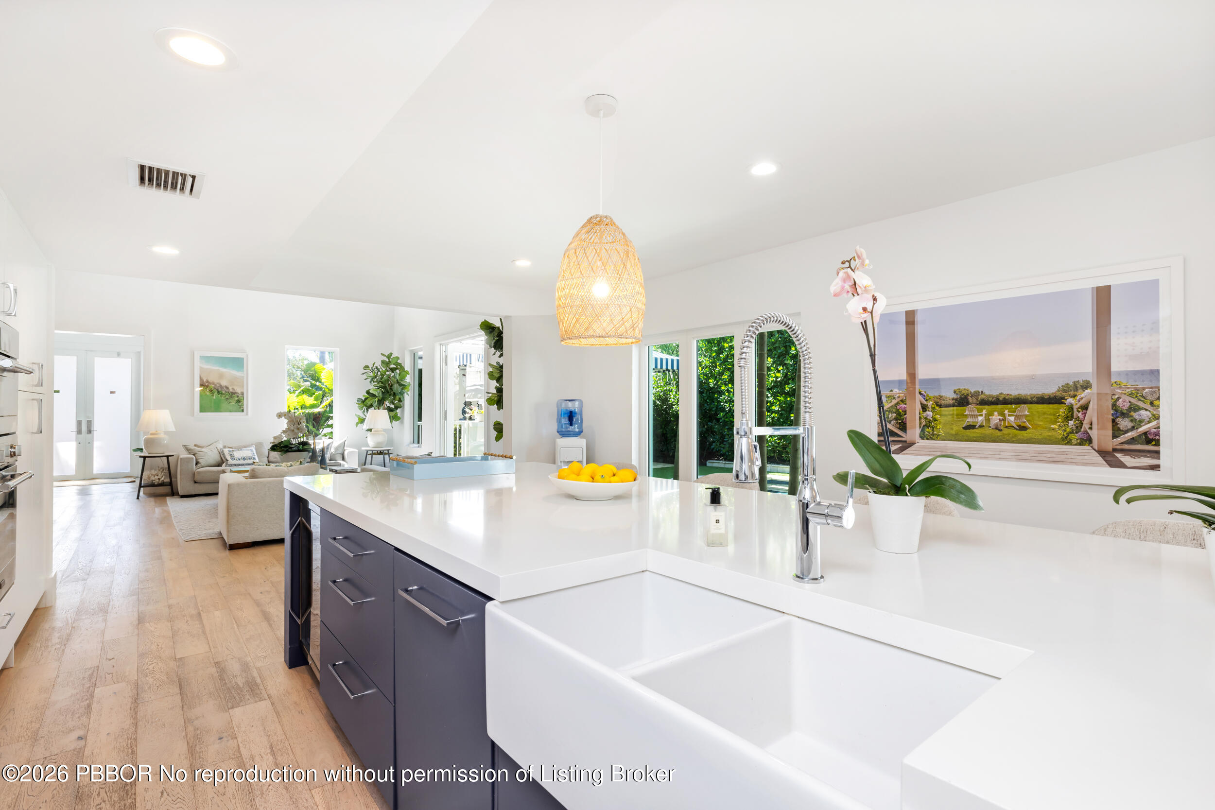 121 Seville Road West Palm Beach, FL 33405 - Photo 20 of 67 a kitchen with a sink and living room view